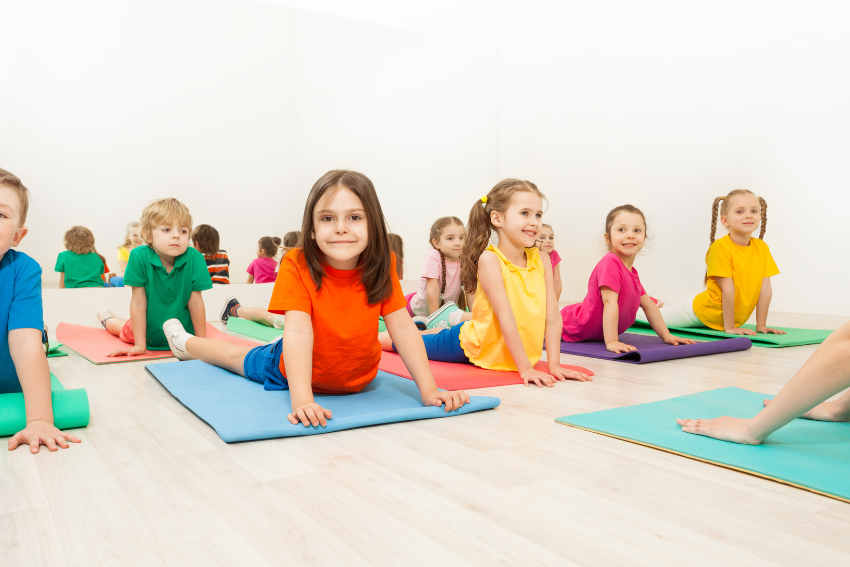 Children in a yoga pose