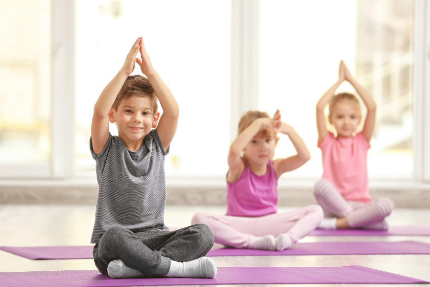 children in a yoga pose