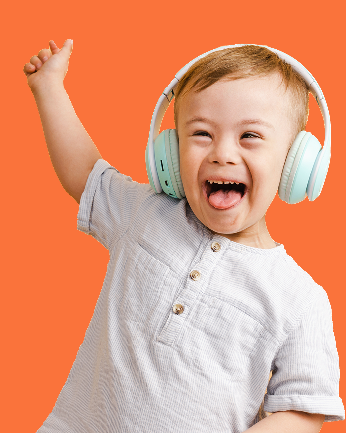 Little boy, smiling, wearing headphones