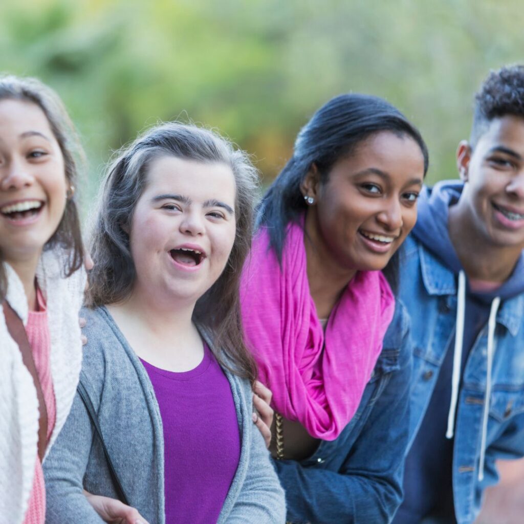 Girl with down syndrome and friends during Down Syndrome Awareness Month